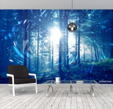 Picture of Blue foggy forest fairytale with spiral circle fireflies bokeh background Color filter effect used